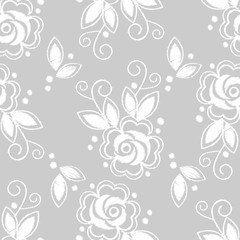 Seamless background. White embroidery on a grey background. Sewing. Textile rapport.

