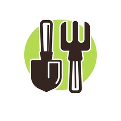 Obraz premium Gardening instruments spade and pitchfork isolated on white