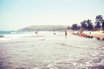 Goa, India, the beach of Arambol. Tropical sandy beach of the Arabian Sea.
