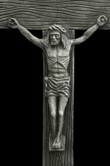 the crucifixion of Jesus Christ as a symbol of God's love  (antique statue)