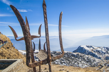 Fototapeta premium Wallpaper Macro tibetan prayer flags yellow blue red green white mountain path religion