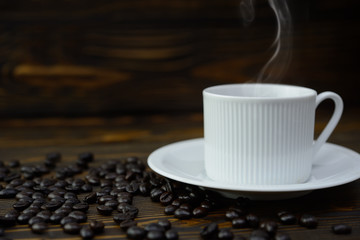 Coffee cup with coffee bean vintage style on the old wooden