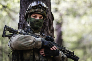 Fototapeta premium Portrait of officer with gun