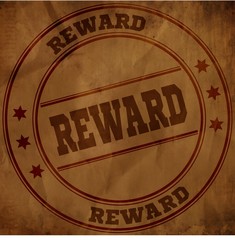 REWARD stamp on old brown crumpled paper.