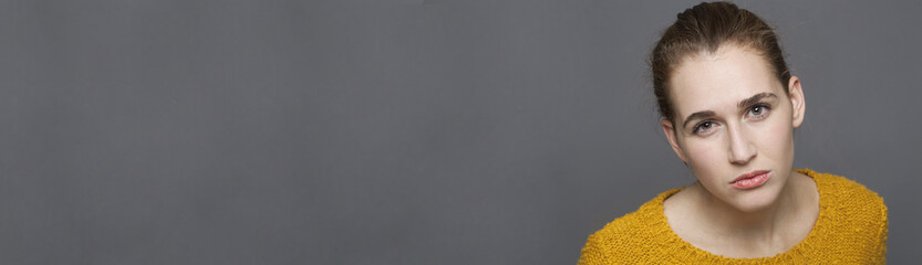 dirty look from girl having questions and doubts, long banner