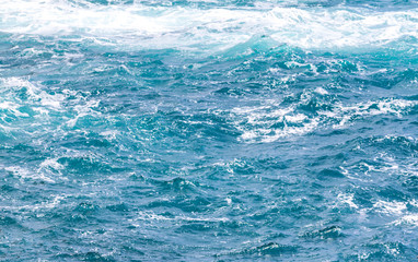 Turquoise sea water background.Colourful sea water and waves