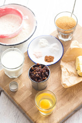 Baking ingredients for pastry on white wooden rustic table. Step by step recipe. 