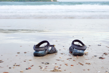 sandals on sea the beach.