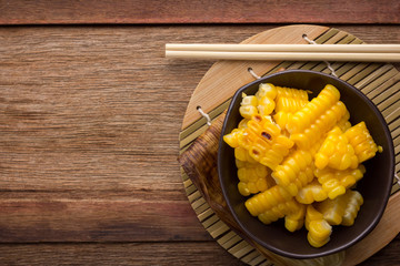 split corn on wood background