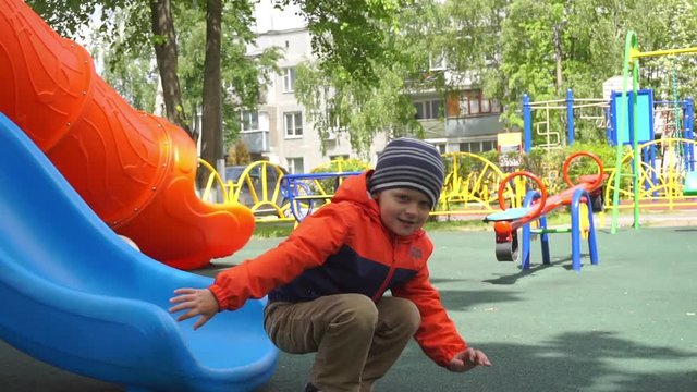 Cute little boy riding on the hill, slow motion hd video