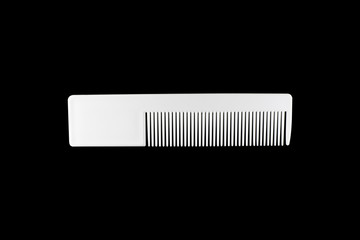 Hairbrush isolated on black background with clipping path.