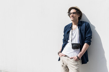 Pleasant trendy teenager enjoying sunny day