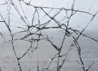 Shattered glass window pane close up