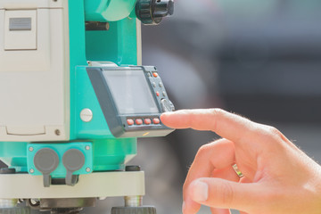 Theodolite instrument for measuring angles in construction industry.