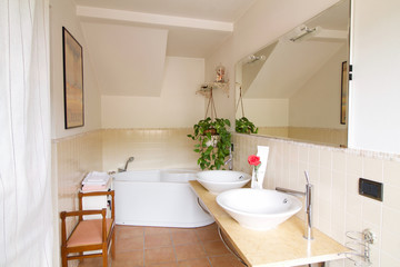 Naklejka na ściany i meble bathroom with bathub and couple of washbasins in country house