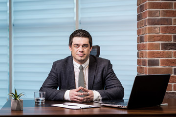 Businessman Working Laptop Connecting Networking Concept,Businessman working with documents on office desk.Business concept.Close up