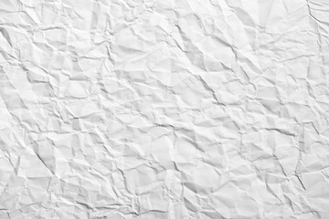 Zerknittertes weißes Papier als Hintergrund oder Textur