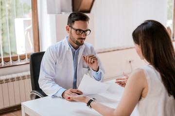 Fototapeta premium Patient is telling doctor about his health problems.