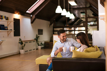 Young couple spending time in the living room