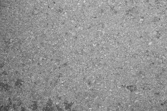 Asphalt background texture with some fine grain with road