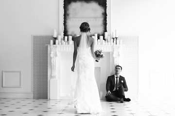 Bride in a white dress at a wedding is beautifully solemn