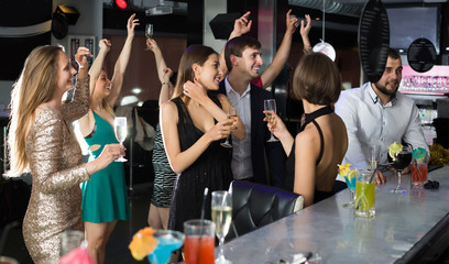 Fototapeta na wymiar Students dancing in the bar