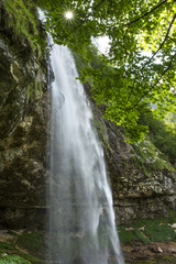 Fototapeta na wymiar The view of Goriuda waterfall in Friuli region.