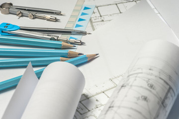 Workplace of architect - rolls and plans.