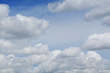 Blue sky with big shape cumulus cloud in the afternoon. Soft focus. Background concept with copy space.