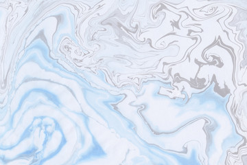Suminagashi marble texture hand painted with blue ink. Digital paper. Radiant liquid abstract background.