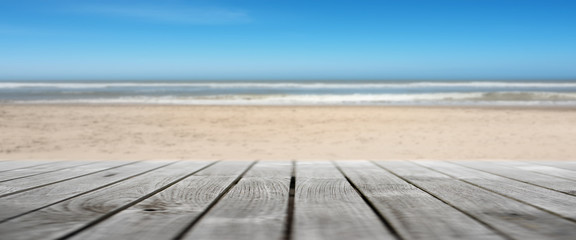 Wooden terrace on an empty beach