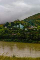 Fototapeta na wymiar Bhutanese village near the river at Punakha, Bhutan