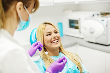 Young Woman At The Dentist