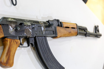 Kalashnikov rifle wrapped in scotch is on the table