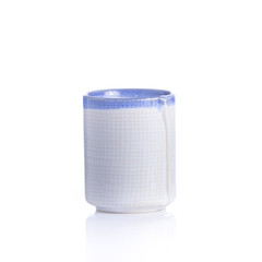 Japanese sake cup and bottle on white background