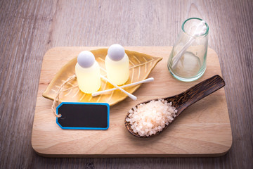 SPA and wellness - towel, salt, white wood background