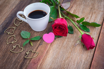 red roses on wooden Board