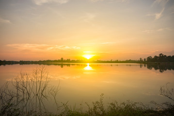 Fototapeta na wymiar Lake and sunset sky