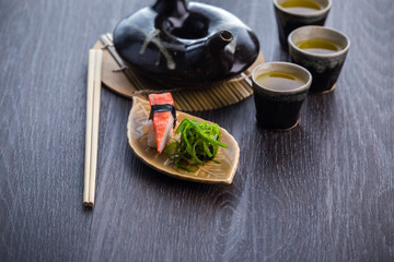 tea set and sushi