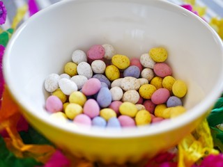 Bowl of colorful candy eggs