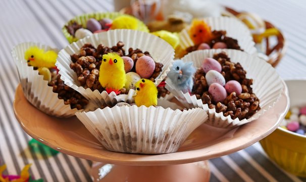 Handmade chocolate easter nests with bird decorations