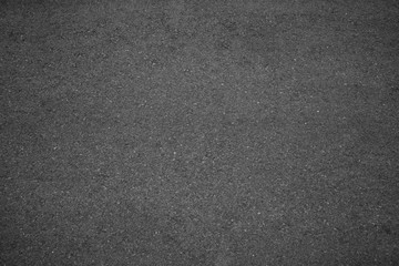 Asphalt background texture with some fine grain with road