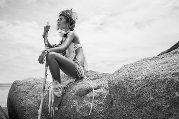 Attractive wild boho woman at beach. Native american style © zolotareva_elina