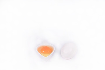 egg  in white bowl  with white background