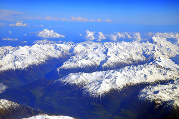 Naklejka premium Swiss and French Alps covered in snow - Aerial view
