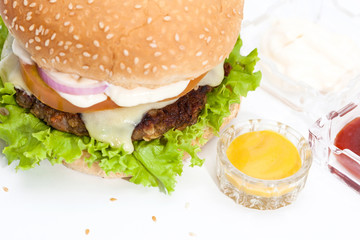 Lentil Burger Preparation : Lentils cheeseburger on white background