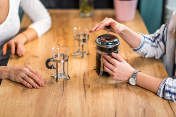 Girlfriends having coffee together