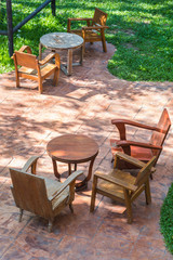 wooden table set in garden
