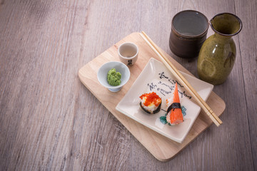 Fototapeta na wymiar japanese sushi and sake set