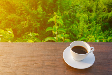 coffee cup clock on old wooden table